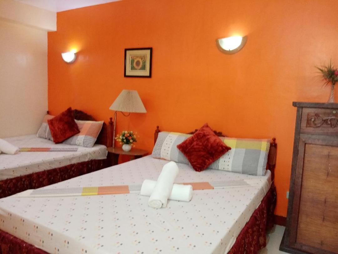 Tiniguiban D'Lucky Garden Inn & Suites المظهر الخارجي الصورة