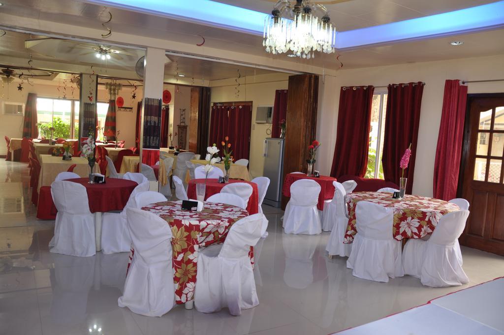 Tiniguiban D'Lucky Garden Inn & Suites المظهر الخارجي الصورة