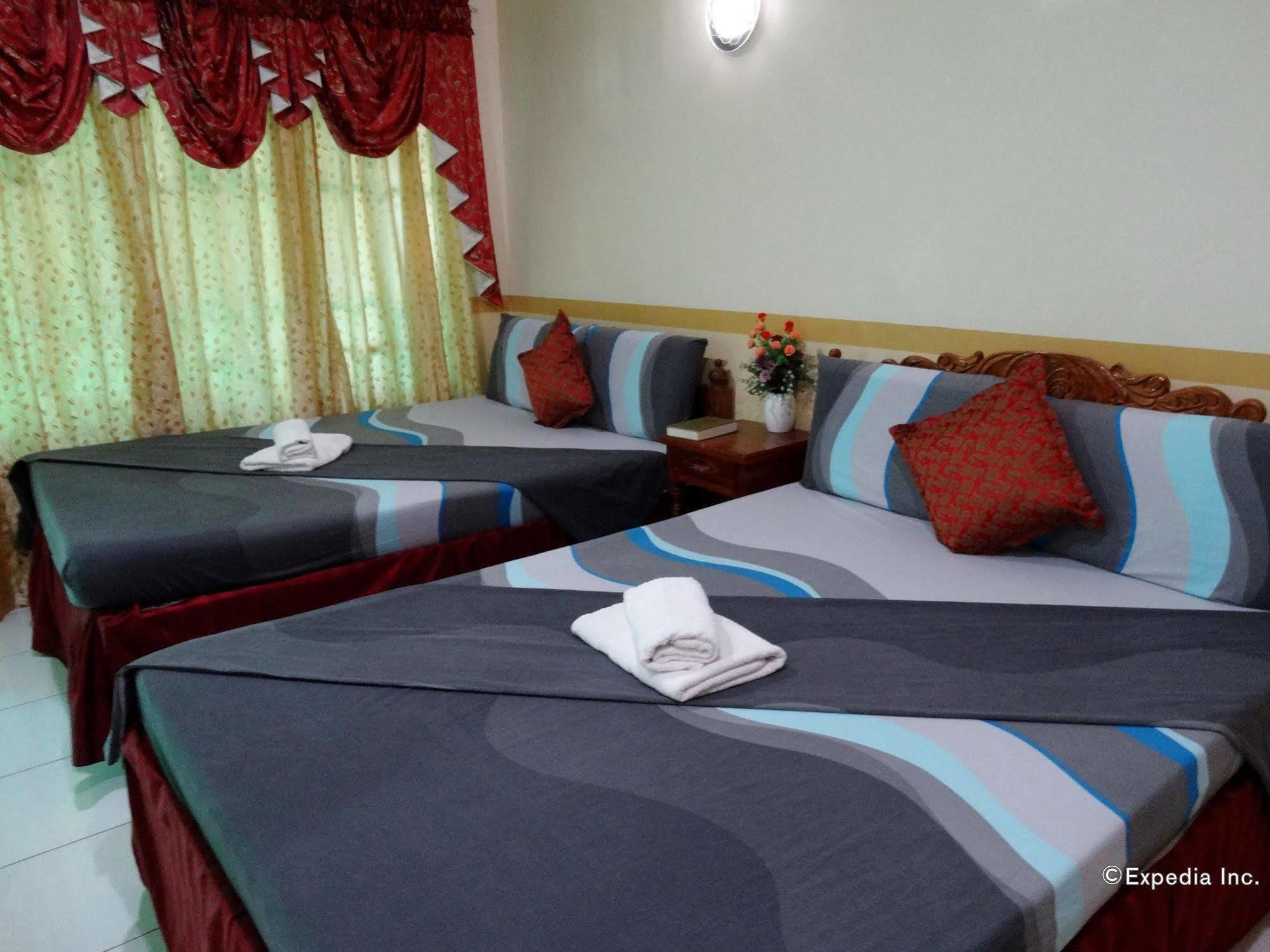 Tiniguiban D'Lucky Garden Inn & Suites المظهر الخارجي الصورة