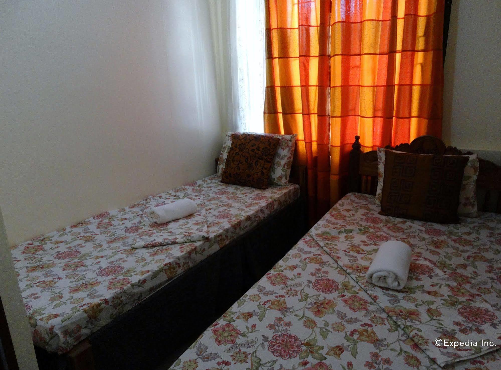 Tiniguiban D'Lucky Garden Inn & Suites المظهر الخارجي الصورة
