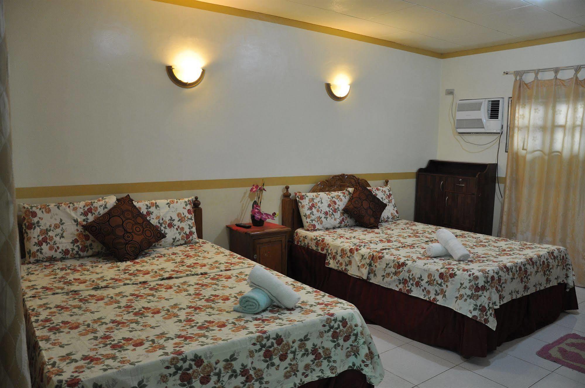 Tiniguiban D'Lucky Garden Inn & Suites المظهر الخارجي الصورة