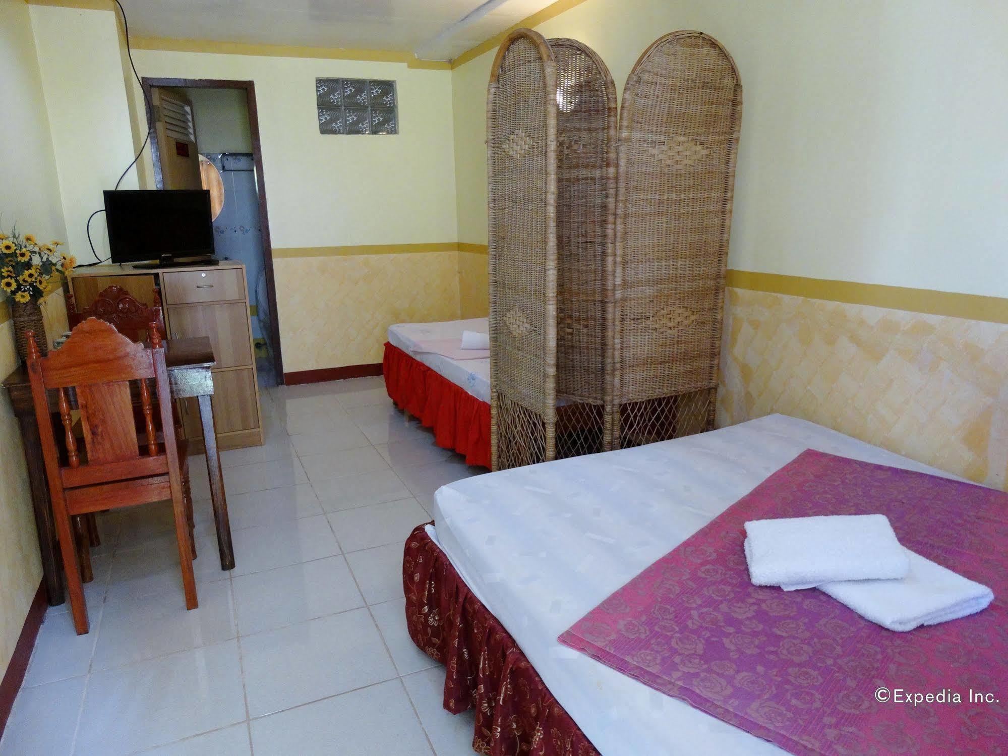 Tiniguiban D'Lucky Garden Inn & Suites المظهر الخارجي الصورة