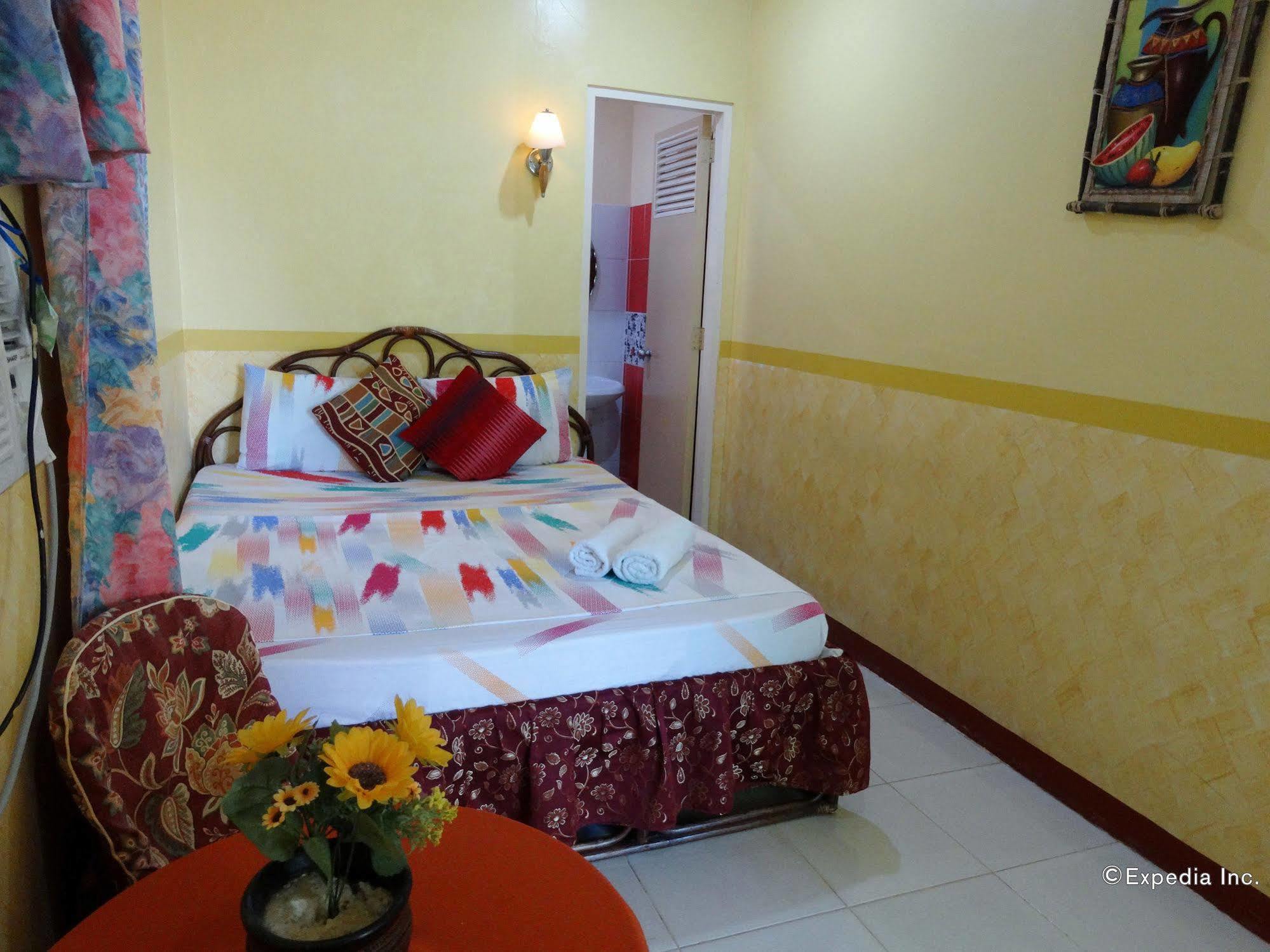 Tiniguiban D'Lucky Garden Inn & Suites المظهر الخارجي الصورة
