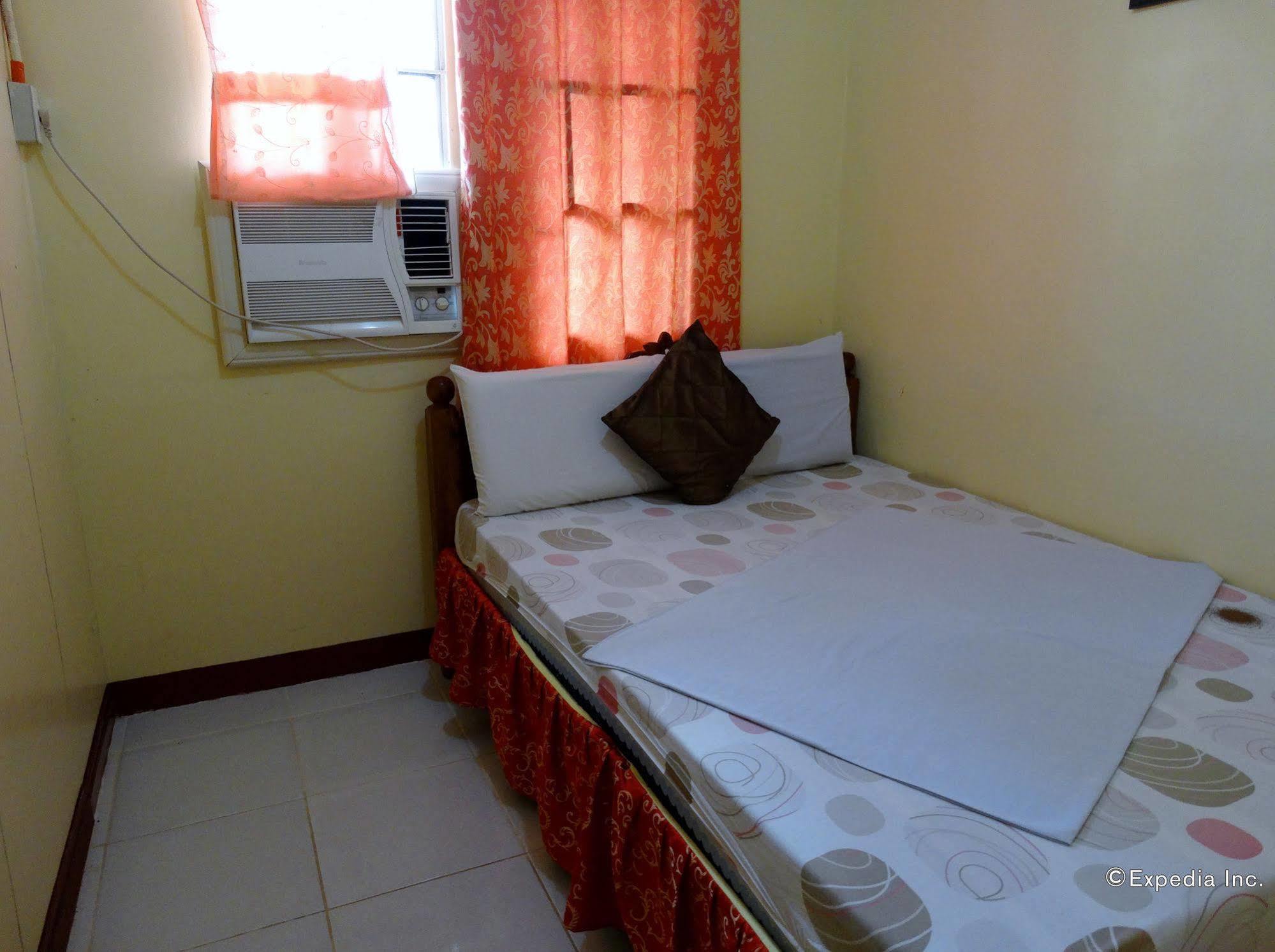 Tiniguiban D'Lucky Garden Inn & Suites المظهر الخارجي الصورة