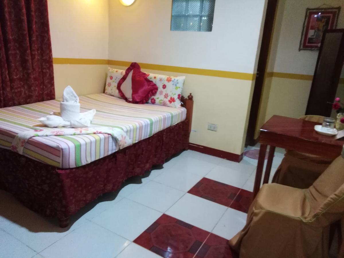 Tiniguiban D'Lucky Garden Inn & Suites المظهر الخارجي الصورة